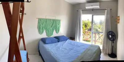 Uma cama ou camas num quarto em Lindo Flat Na Paradisíaca Praia da Taíba
