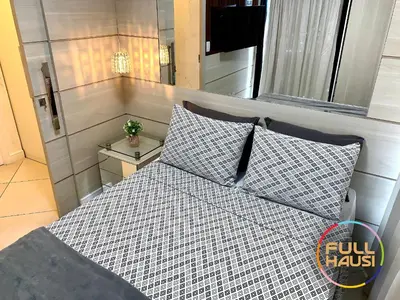 Uma cama ou camas num quarto em Landscape Flat Charmoso Condomínio na Beira Mar