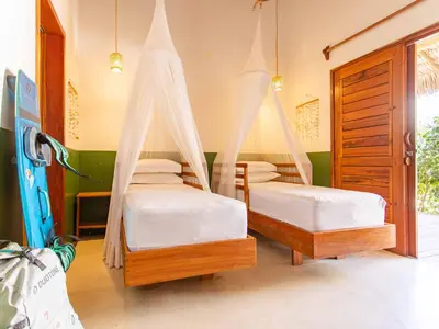 Uma cama ou camas num quarto em Vilarejo Preá