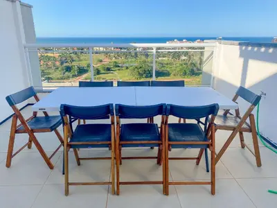 Uma varanda ou terraço em Beach Townhouses I por Be My Guest
