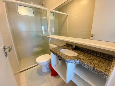 Uma casa de banho em Beach Townhouses I por Be My Guest