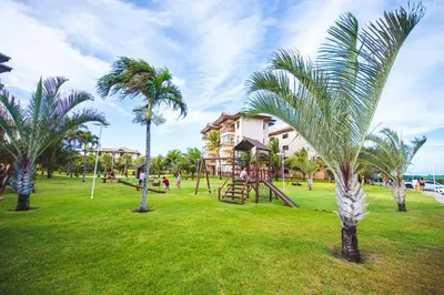 Um jardim no exterior de VG SUN Cumbuco AP304