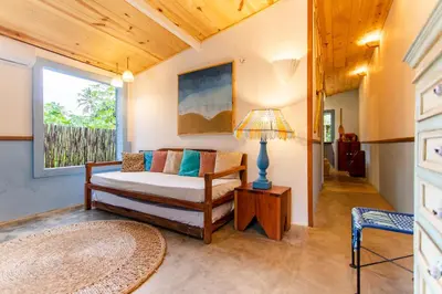 Uma cama ou camas num quarto em Casa PROX AO MAR - Icaraizinho de Amontada