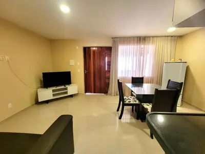 Uma televisão e/ou sistema de entretenimento em Sunset Beach Taíba Hotel