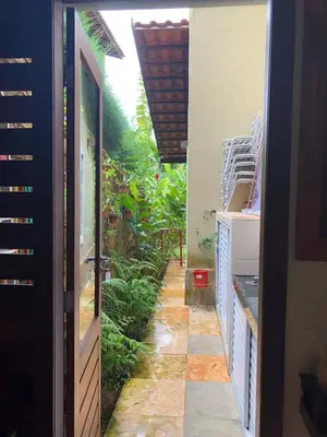 Um jardim no exterior de CHALÉ RECANTO SAGRADO( MONTE VERDE)
