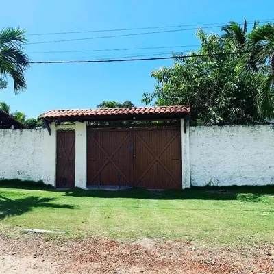 Um jardim no exterior de CASA LAGOA DO BANANA/CUMBUCO