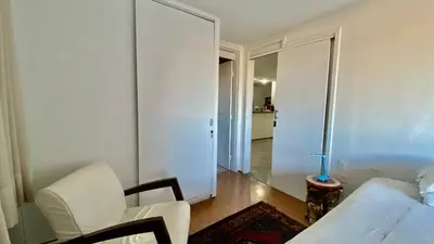 Uma cama ou camas num quarto em Apartamento vista mar, 2 Suítes, WC Social,2 vagas