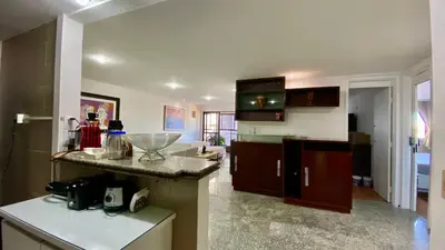 A cozinha ou kitchenette de Apartamento vista mar, 2 Suítes, WC Social,2 vagas
