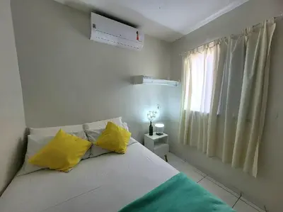 Uma cama ou camas num quarto em Teto Hospedagens Va