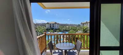 Uma varanda ou terraço em VG SUN CUMBUCO - PARAÍSO PÉ NA AREIA PARA 4 PESSOAS - COM HIDRO, SAUNA, PISCINA, COZINHA COMPLETA, PARQUINHO E WI-Fl