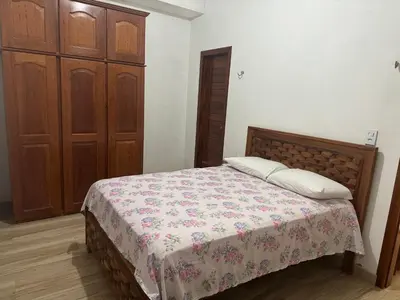Uma cama ou camas num quarto em Casa Tropicana