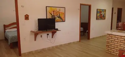 Uma televisão e/ou sistema de entretenimento em Casa Tropicana