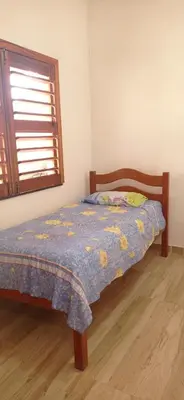 Uma cama ou camas num quarto em Casa Tropicana