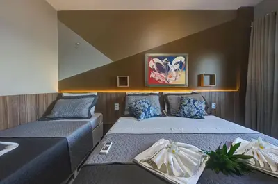 Uma cama ou camas num quarto em Van Piaget #1401- Apto com Vista Mar by Carpediem