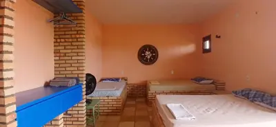 Uma cama ou camas num quarto em Flat Casa Taiba 2002