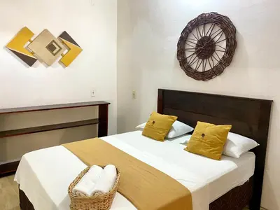 Uma cama ou camas num quarto em Casa Amiga Jeri