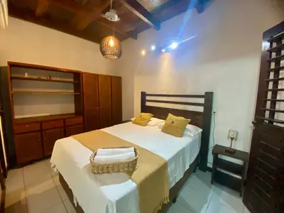 Uma cama ou camas num quarto em Casa Amiga Jeri