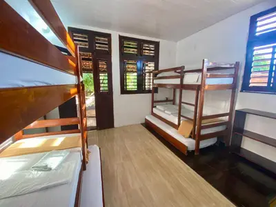 Uma cama ou camas num quarto em Casa Amiga Jeri