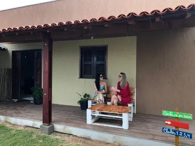 Os clientes hospedados em Studio pé na areia com 2 quartos, sala e cozinha