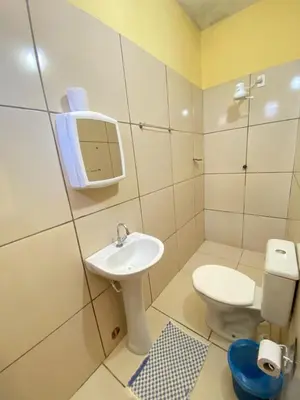 Uma casa de banho em Pousada do Ary
