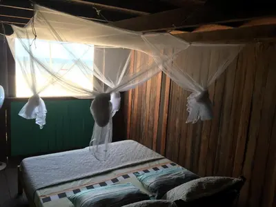 Uma cama ou camas num quarto em Casa tartaruga