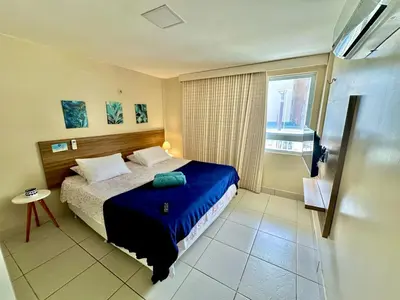 Uma cama ou camas num quarto em Terramaris Vista Para o Mar - Térreo