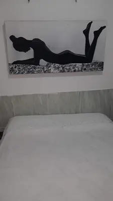 Uma cama ou camas num quarto em HOSPEDARIA CONSULADO PAULISTA