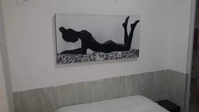 Uma cama ou camas num quarto em HOSPEDARIA CONSULADO PAULISTA