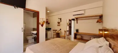 Uma cama ou camas num quarto em Suítes Jardins de Flecheiras