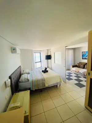 Uma cama ou camas num quarto em Velas do Mucuripe by DS Imóveis