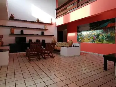 Uma área de estar em Villa Oloh com lazer completo em Caucaia - CE