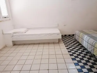 Uma cama ou camas num quarto em Villa Oloh com lazer completo em Caucaia - CE