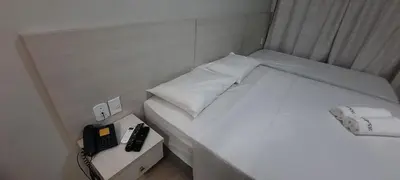 Uma cama ou camas num quarto em 102 Lindo Flat mobiliado na Praia de Iracema