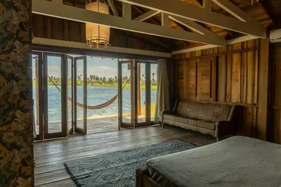 Uma cama ou camas num quarto em Casa na Lagoa