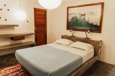 Uma cama ou camas num quarto em Casa na Lagoa