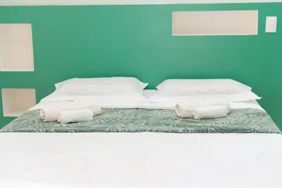 Uma cama ou camas num quarto em Casa CLAUDIA