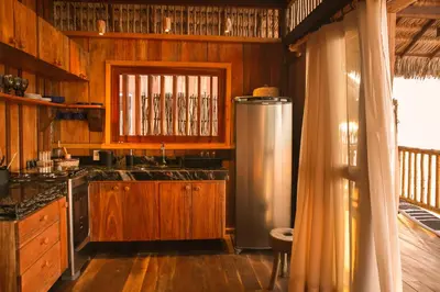 A cozinha ou kitchenette de Vila Beijú BARRINHA - Frente Mar!