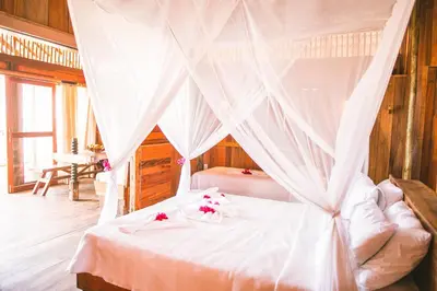 Uma cama ou camas num quarto em Vila Beijú BARRINHA - Frente Mar!
