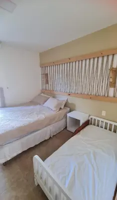 Uma cama ou camas num quarto em Taiba Beach Resort Térreo 2 quartos