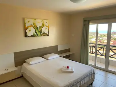 Uma cama ou camas num quarto em San Valentino Porto das Dunas by DS Imóveis