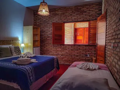 Uma cama ou camas num quarto em Pousada Bella Mar
