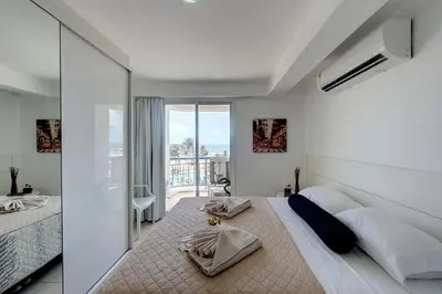 Uma cama ou camas num quarto em Beach Village #403 - Praia do Futuro por Carpediem