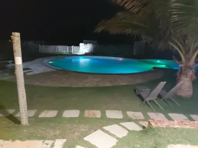 A piscina em ou perto de VILAS NA PRAIA RESIDENCE O PARAÍSO É AQUI