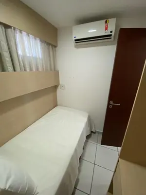 Uma cama ou camas num quarto em Beach Class - Vista Mar