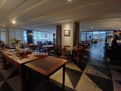Um restaurante ou outro lugar para comer em Saint Martin By Escala Imóveis