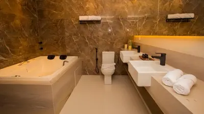 Uma casa de banho em Paraiso Beach Hotel