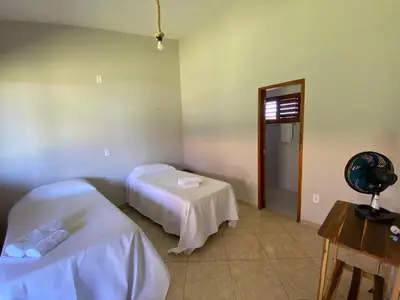 Uma cama ou camas num quarto em Takito Kite House, Praia da Baleia, Itapipoca CE