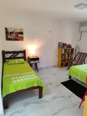 Uma cama ou camas num quarto em Lindo Apartamento na Praia do Futuro