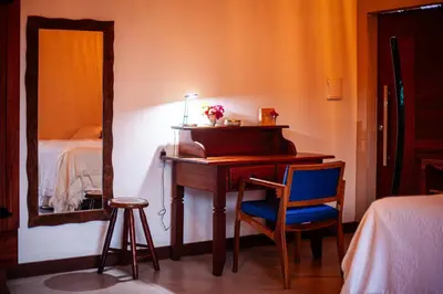 Uma cama ou camas num quarto em Hotel de Charme Illuminare Stile