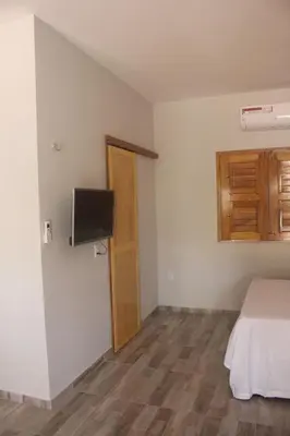 Uma televisão e/ou sistema de entretenimento em Vila Cajoá -lagoa do paraiso